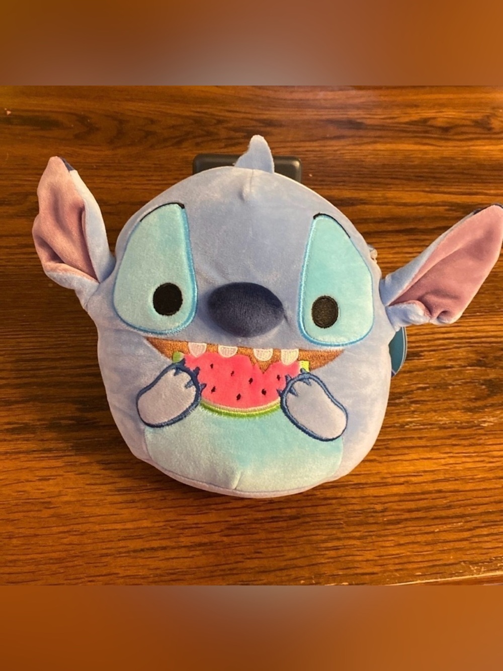 Squishmallows Disney Stitch eating a watermelon